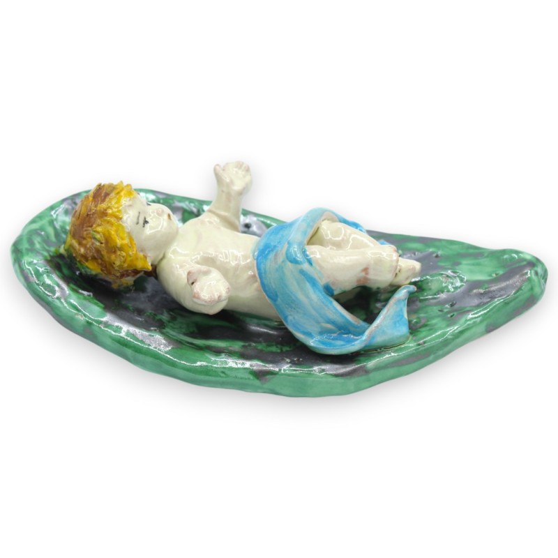 Baby Jesus on a prickly pear...
