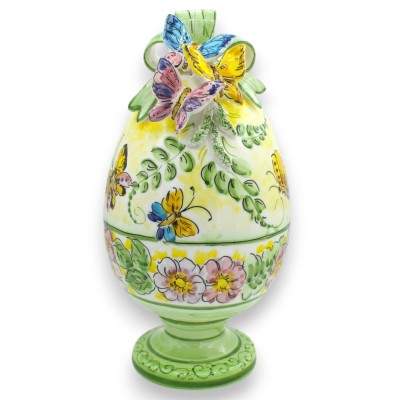 Uovo con gambo, in pregiata ceramica, h 33 x Ø 17 cm cm ca. con applicazioni, decoro floreale e farfalle