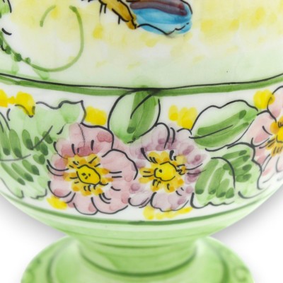 Ovo com haste, em cerâmica fina, aproximadamente 33 cm de altura x 17 cm de diâmetro, com aplicações, decoração floral e borbole
