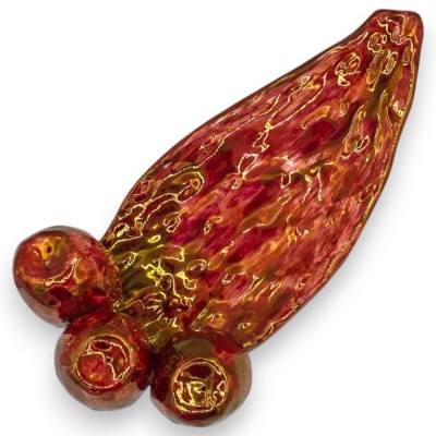 Pá em formato de figo-da-índia, cerâmica de Caltagirone, aproximadamente 30 cm de comprimento x 10 cm de altura. Vermelha, terce