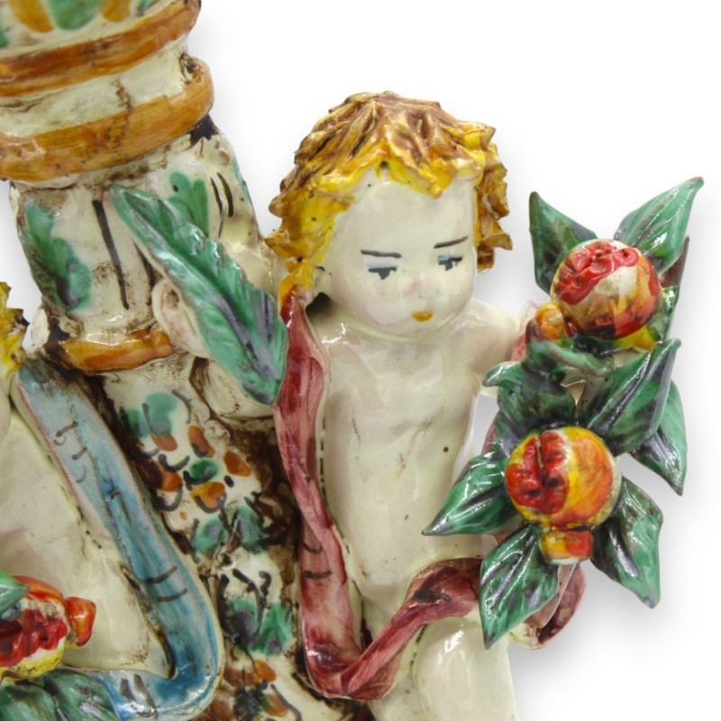 Porta candela con putti in ceramica...