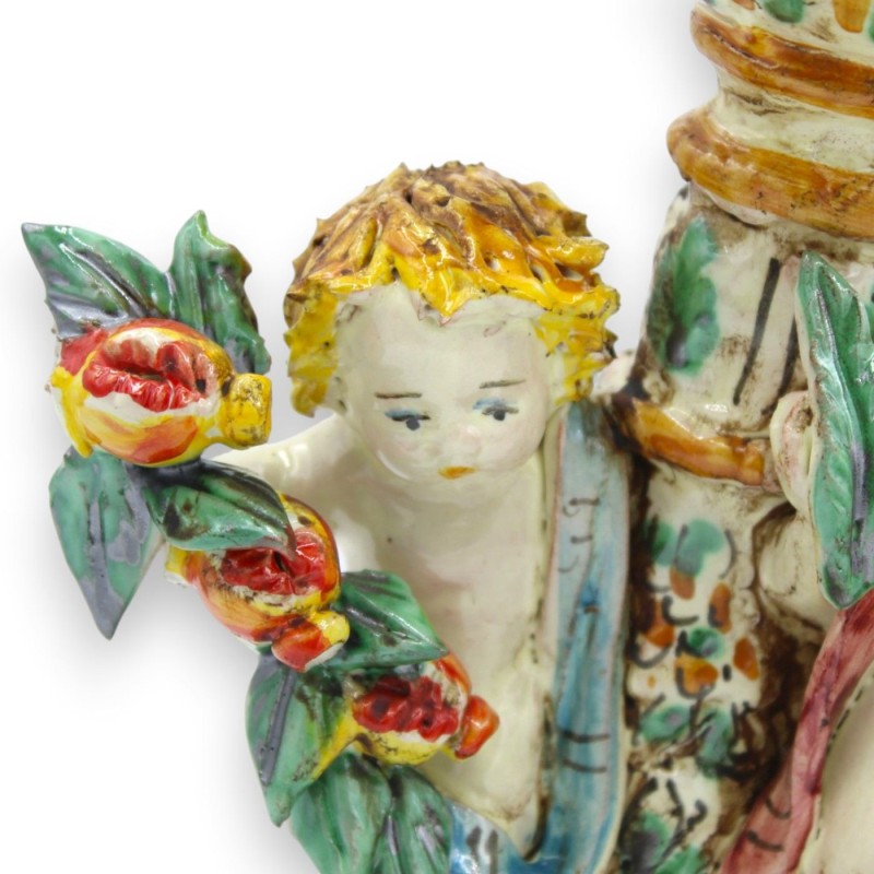 Porta candela con putti in ceramica...