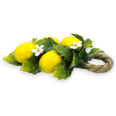 Citronknippe med fläta, fin keramik, H 24 x B 14 cm ca. Med applikationer av apelsinblommor