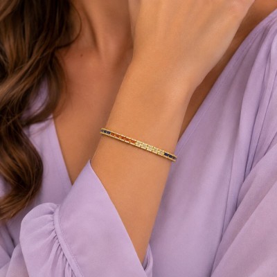 Pulseira de tênis em prata 925 com banho de ouro, comprimento aproximado de 20 cm. Coleção RAINBOW, cristais multicoloridos. Uni