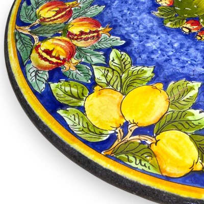 Round table in Etna lava stone Ø 80 cm, wrought iron pedestal, citrus fruit, pomegranate and prickly pear decoration
