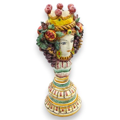 Janus Bifrons head with two faces Candlestick, Caltagirone ceramic, h 33 cm approx. Bordeaux background
