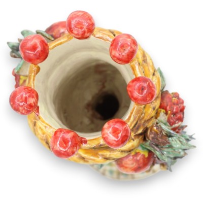 Głowa Janusa Bifronsa z dwiema twarzami. Świecznik, ceramika Caltagirone, wys. ok. 33 cm. Zielone tło i czerwone detale.