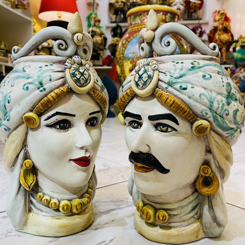 Pair of Caltagirone dark brown heads - height 25 cm Crown tip green decoration - 